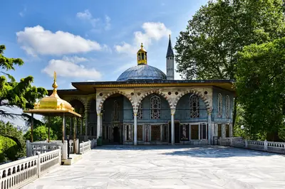 Historic Ottoman pavilion with intricate architecture, located in Istanbul's Topkapi Palace.